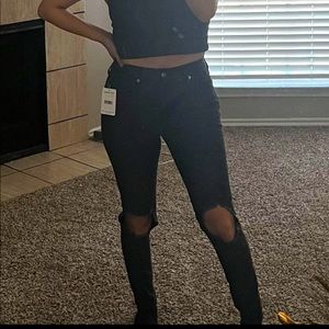 Free People busted knee black jeans